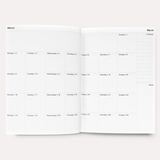 A5 monthly layout of the 2026 planner with notes and priorities. Employee appreciation gifts with impact
