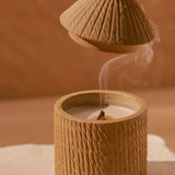 Artisan made candle with hut lid. Sustainable women-owned corporate gift.