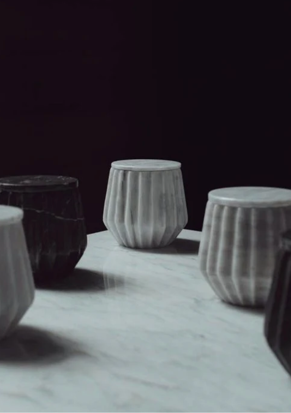 Hand-carved marble jars in grey and black, gifts for corporate women