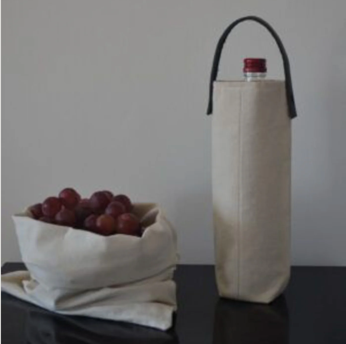 White canvas and leather wine bag