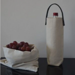 White canvas and leather wine bag