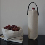 White canvas and leather wine bag