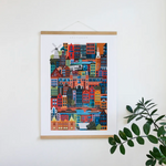 Amsterdam blockprint wall art featuring canals, bicycles and historic buildings. Unique sustainable corporate gift for clients.