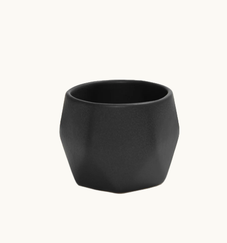Detail of ceramic coffee cup in black handcrafted stoneware, dishwasher and microwave safe. Sustainable employee appreciation gift.