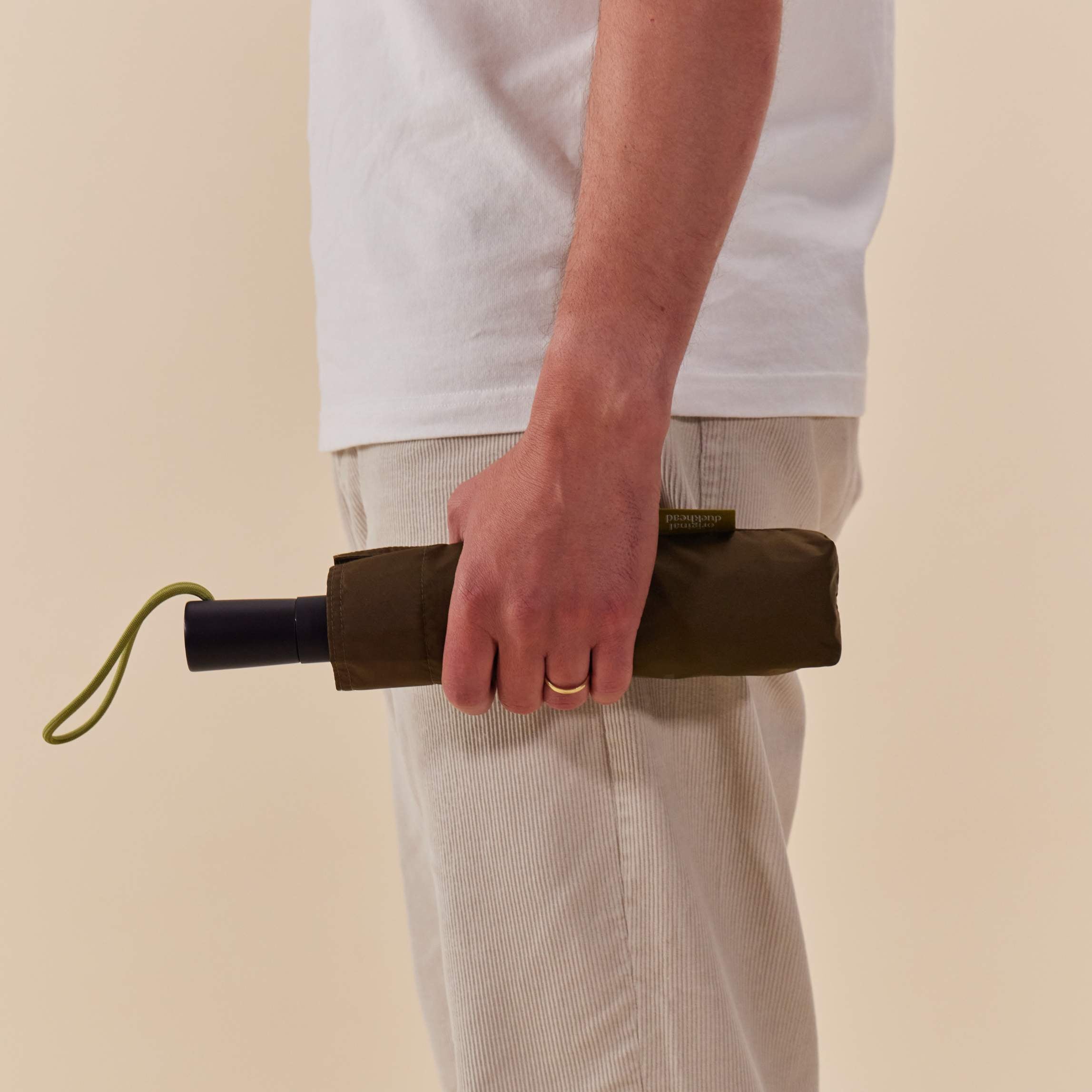Eco-friendly travel umbrella in Dark Olive for sustainable corporate gifting from women-owned brands