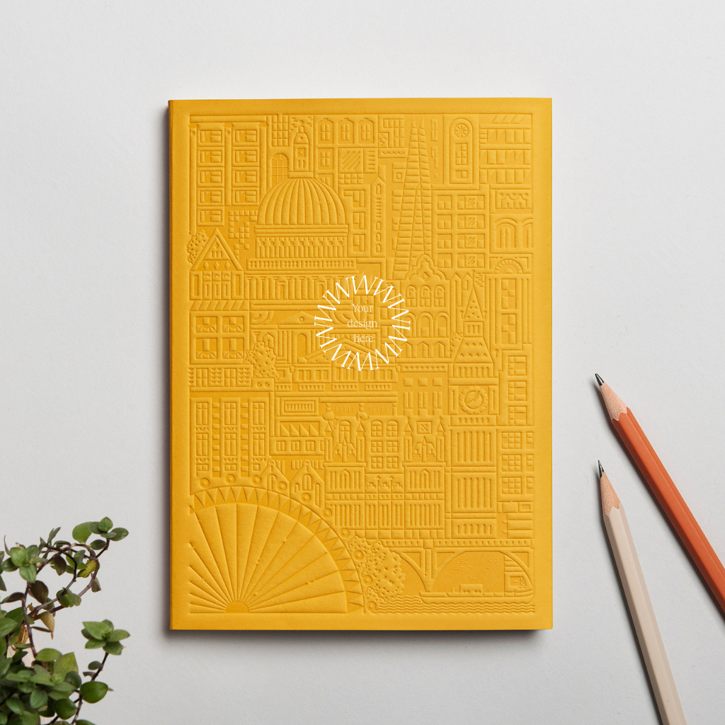 Debossed London notebook in yellow, branded sustainable merch