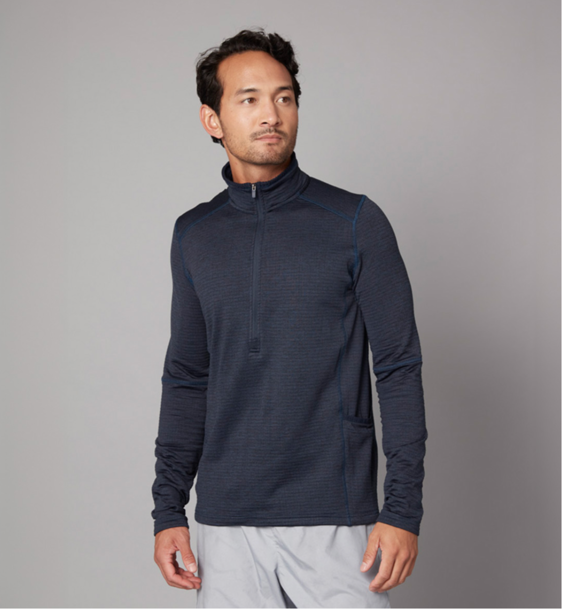 Men's zip neck jumper corporate branded clothing made from sustainable materials.