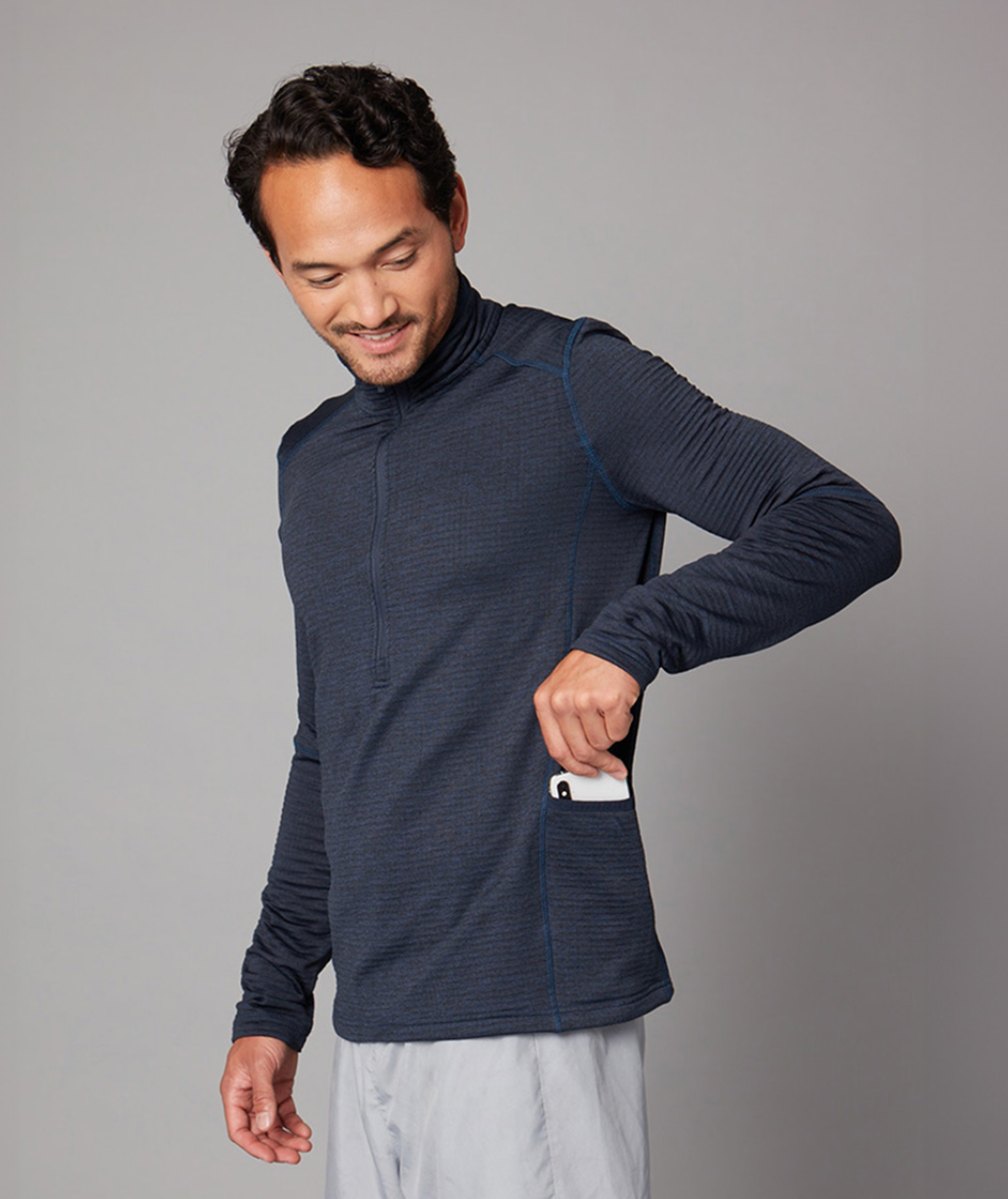 Men's zip neck jumper sustainable branded company swag for corporate events and teams.