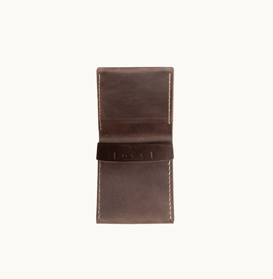 Open vintage brown wallet in Fairtrade certified leather with compartments for cards and notes for sustainable client and employee gifts