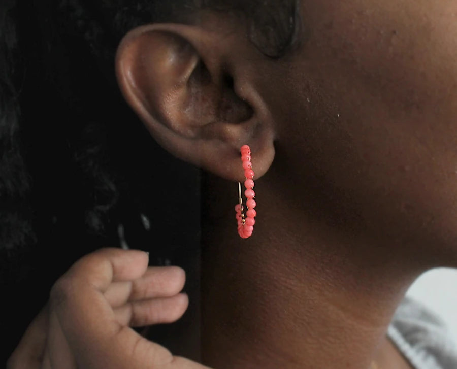 Coral beaded hoop earrings