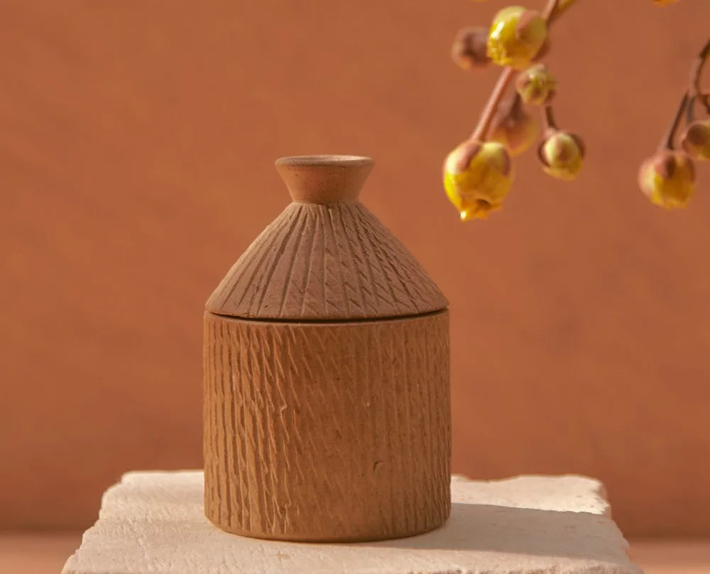 Handcrafted African artisan hut candle, sustainable corporate gifts for women 