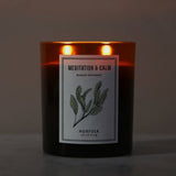 Meditation and Calm aromatherapy candle by Norfolk Natural Living lit with two wicks