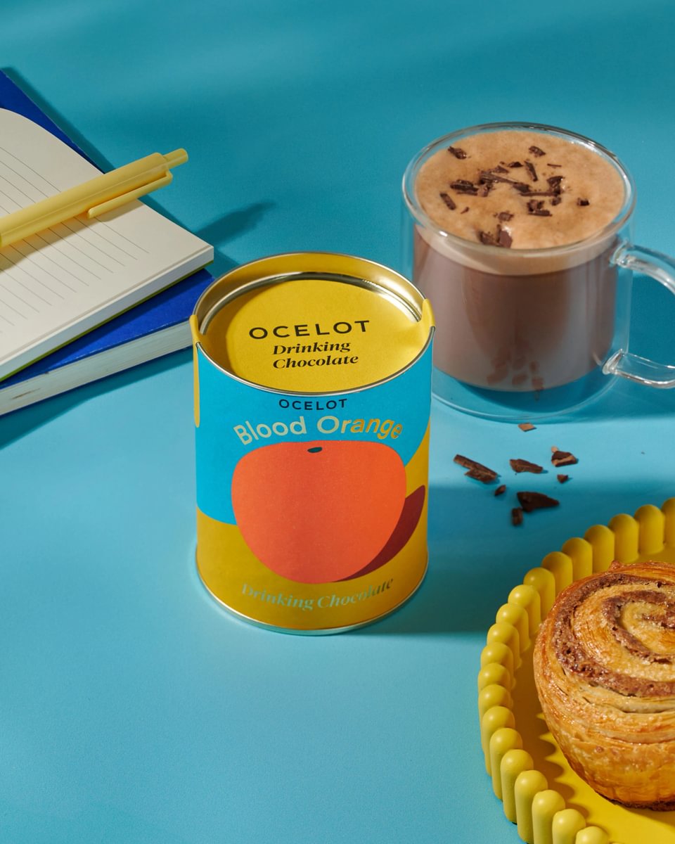 client and employee gifting blood orange drinking chocolate