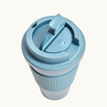 Blue compostable 16oz tumbler with lid, co-brand for sustainable swag and premium eco swag