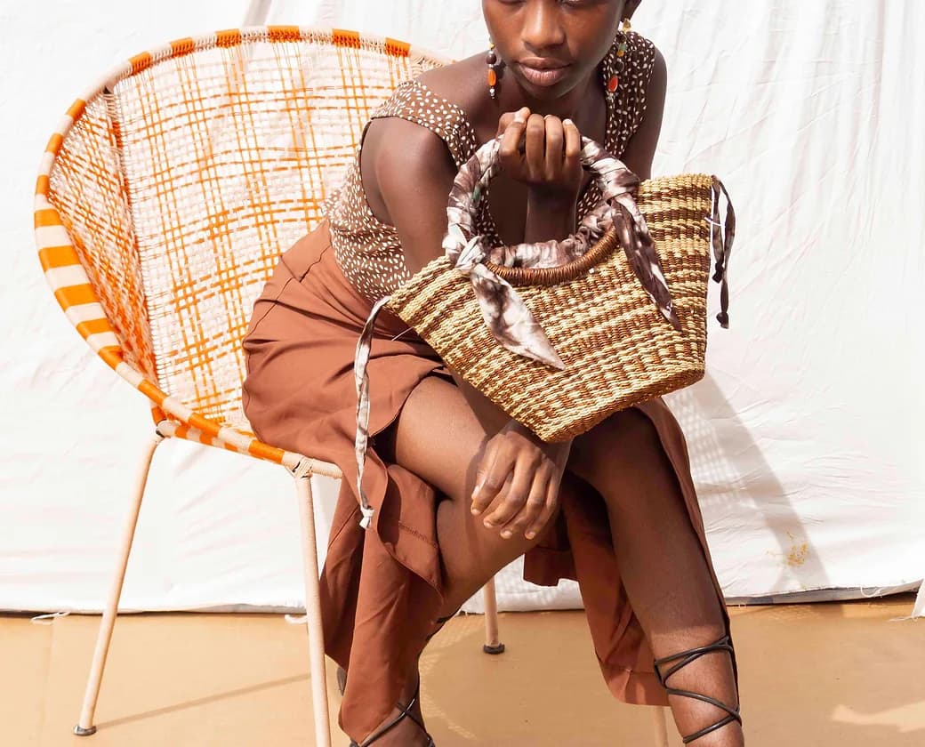 Brown handwoven summer straw bag made in Ghana, premium corporate gift for client events and brand activations