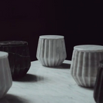 Hand-carved marble jars in grey and black, gifts for corporate women