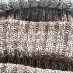 Close up of hand knitted merino wool Fisherman beanies