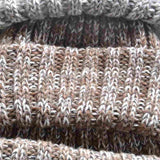 Close up of hand knitted merino wool Fisherman beanies