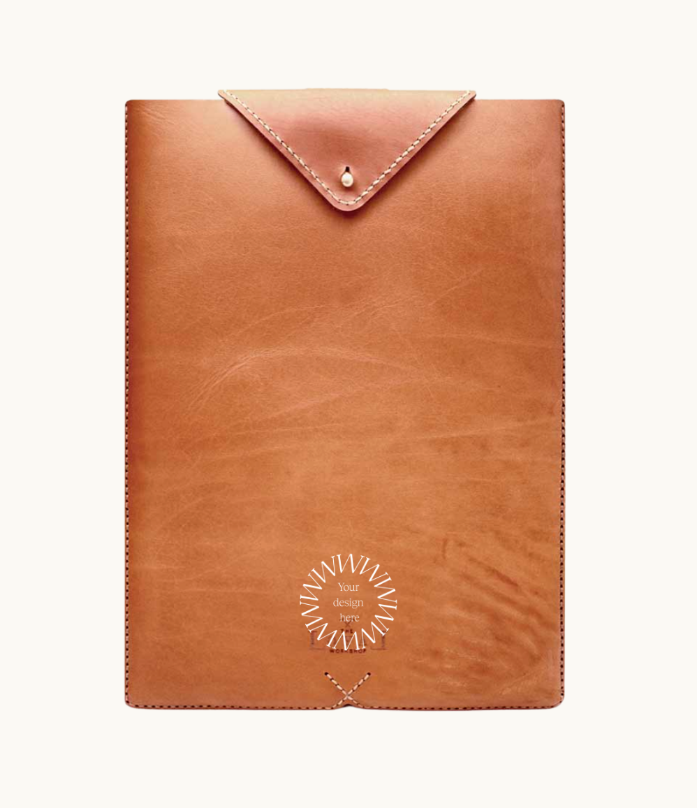 Premium vegan leather laptop sleeve, ethically produced for 13", 14", 15" and 16" MacBook Pros. Personalise with your company logo.