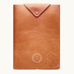 Premium vegan leather laptop sleeve, ethically produced for 13", 14", 15" and 16" MacBook Pros. Personalise with your company logo.