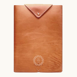 Premium vegan leather laptop sleeve, ethically produced for 13", 14", 15" and 16" MacBook Pros. Personalise with your company logo.