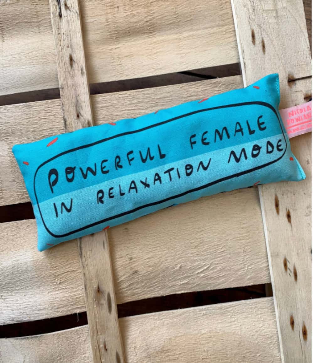 Three blue handmade lavender eye bags with Powerful Female in Relaxation Mode design