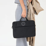 Black recycled laptop briefcase personalised with company logo being carried by hand