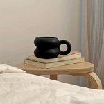 Black Michelin-style ceramic mug with rounded shape, sustainable corporate gifts for clients and employees 