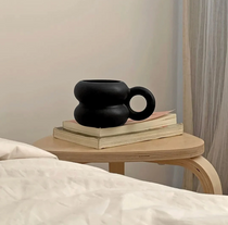 Black Michelin-style ceramic mug with rounded shape, sustainable corporate gifts for clients and employees 