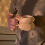 Cream ceramic Michelin mug, artisan made in Mexico. Sustainable client gifts, perfect for company events and team appreciation