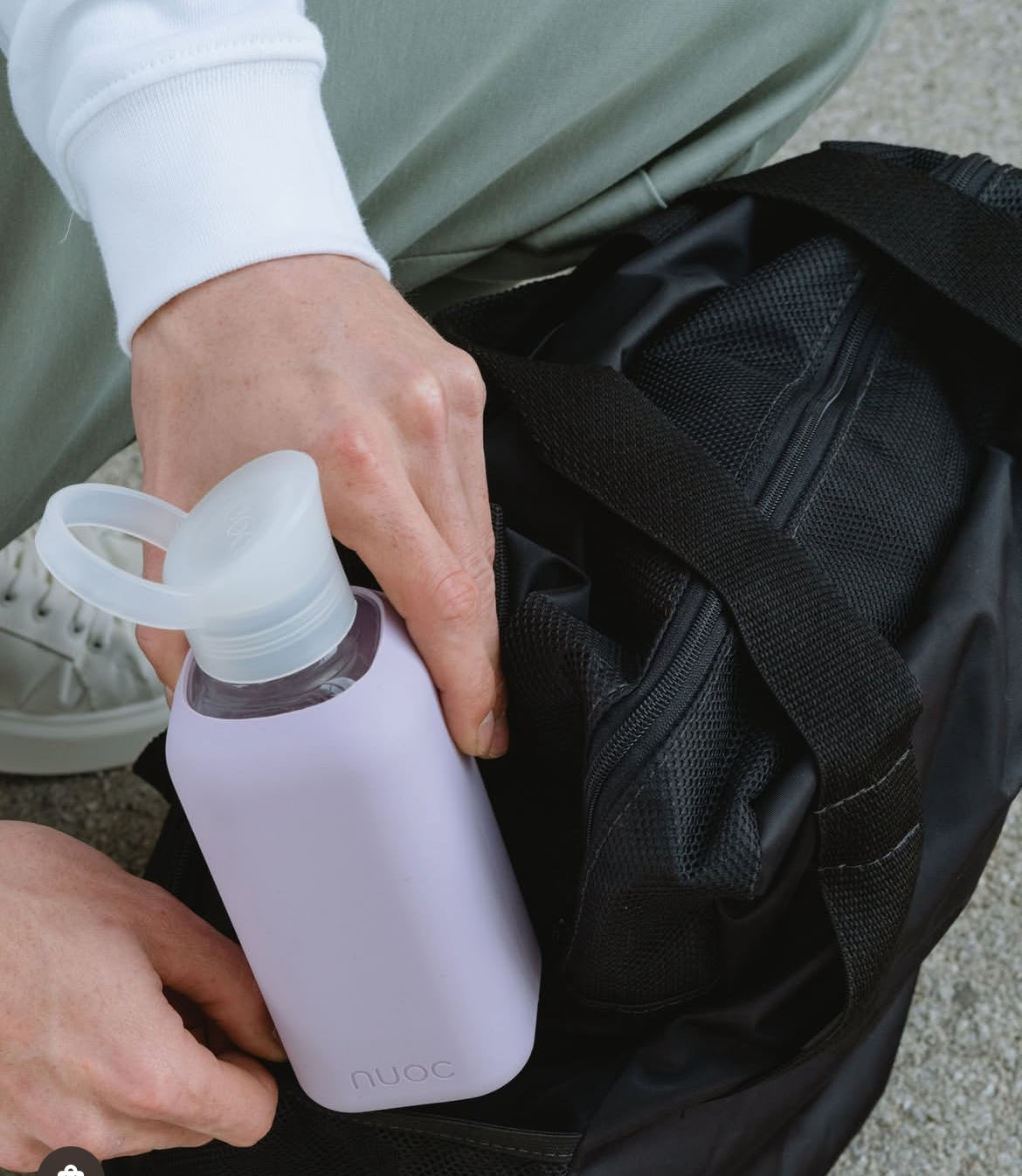 NUOC eco glass bottle with lavender silicone sleeve, 500ml premium swag for conference giveaways and sustainable corporate goodies
