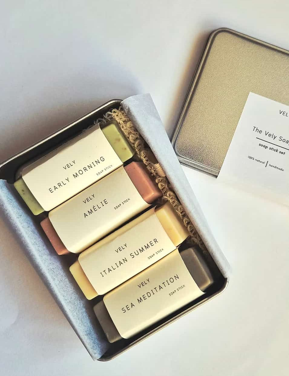 Natural mini soaps gift set with four soaps, sisal soap bag and tin