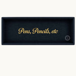 Navy desk tray with gold Pens, Pencils, etc lettering, horizontal view