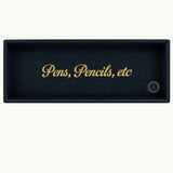 Navy desk tray with gold Pens, Pencils, etc lettering, horizontal view