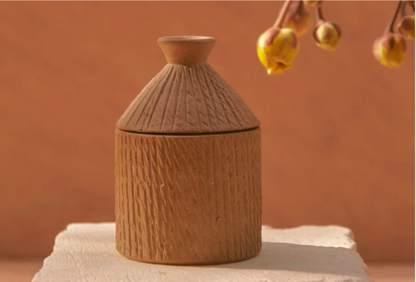 Handcrafted African artisan hut candle, sustainable corporate gifts for women 