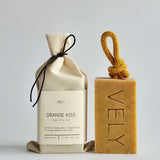 Orange Kiss natural soap on a rope with cotton gift bag