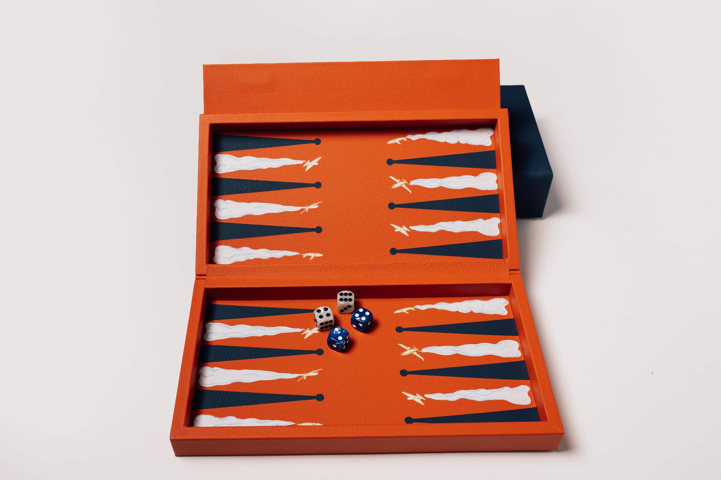 Orange leather booklet backgammon set personalised corporate gift from women owned businesses for client events and executive gifting
