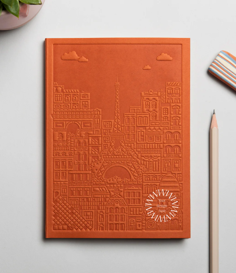 Notebook with embossed design of the city of Paris. High end client gifting from women-owned brands  