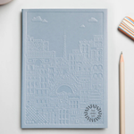 Notebook with embossed design of the city of Paris. Luxury Corporate Gifts from women-owned brands  