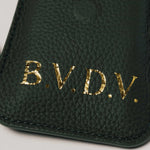 Personalised green leather travel playing cards set, a premium executive gift handcrafted from full grain leather.