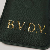Personalised green leather travel playing cards set, a premium executive gift handcrafted from full grain leather.