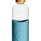 1L reusable glass water bottle with blue silicone sleeve and bamboo lid, sustainable branded merch and eco-friendly corporate gift