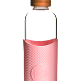 1L reusable glass water bottle with pink silicone sleeve and bamboo lid, eco swag for conferences and sustainable corporate giveaways