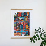 Amsterdam blockprint wall art featuring canals, bicycles and historic buildings. Unique sustainable corporate gift for clients.