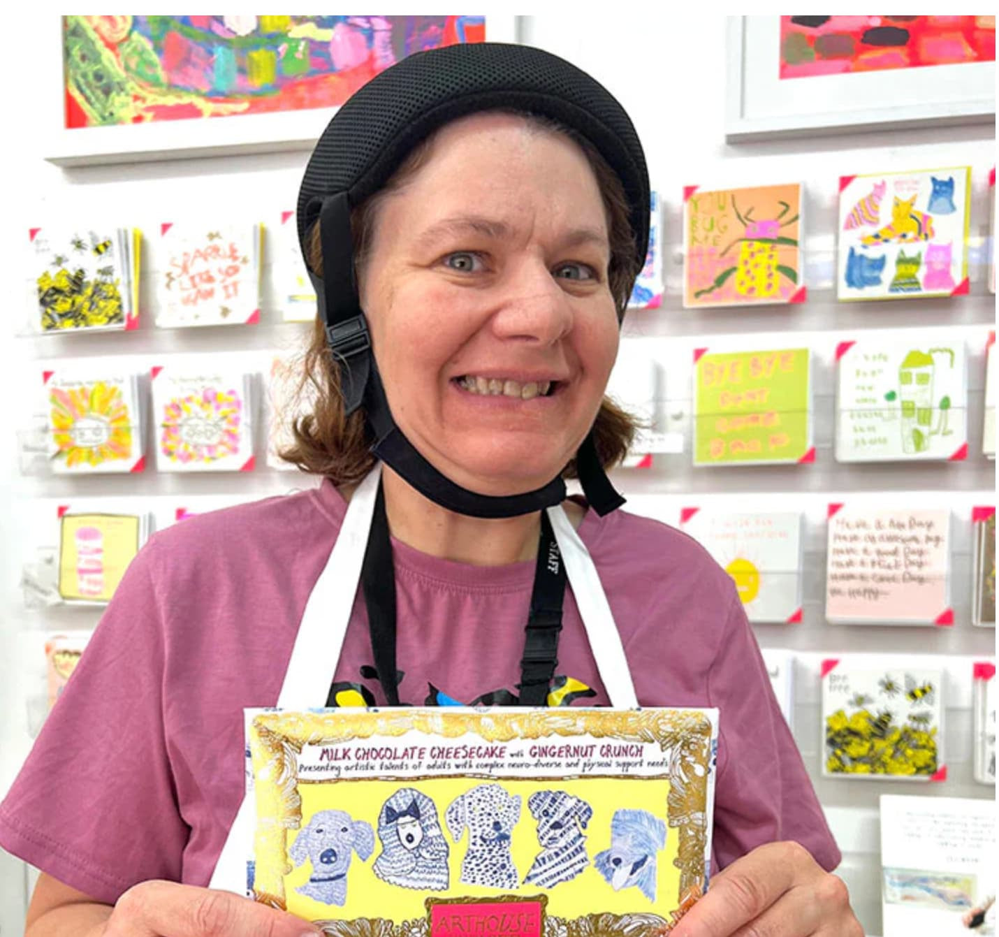 Artist holding Arthouse chocolate bar with original artwork personalised corporate gift executives UK