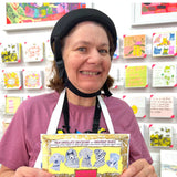 Artist holding Arthouse chocolate bar with original artwork personalised corporate gift executives UK