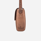 Artisan-made leather crossbody bag with buckle closure, personalised luxury corporate gift for VIP clients and executive gifting