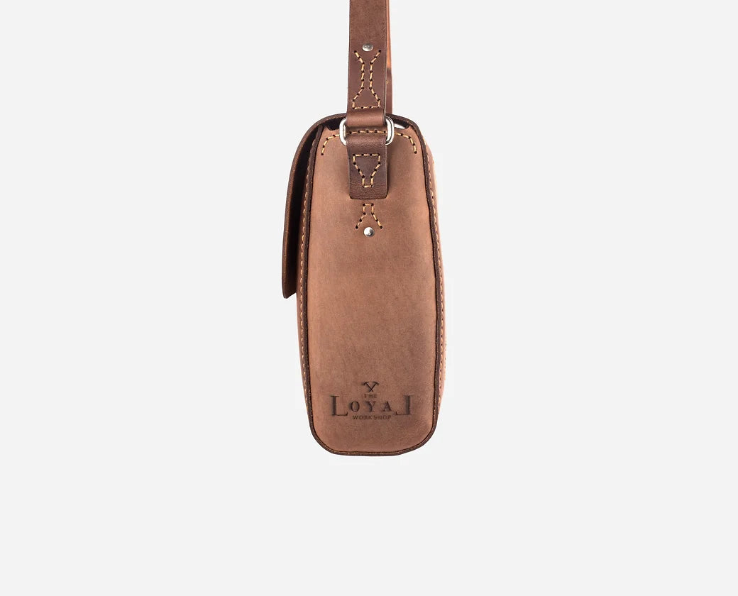 Artisan-made leather crossbody bag with buckle closure, personalised luxury corporate gift for VIP clients and executive gifting