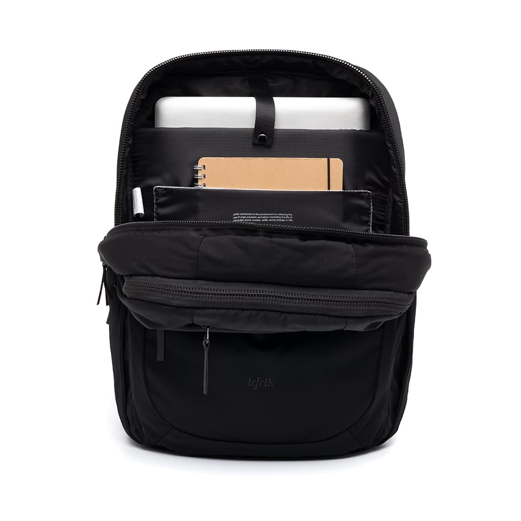Lightweight Water Resistant Backpack 12L in black, inside, showing logo placement