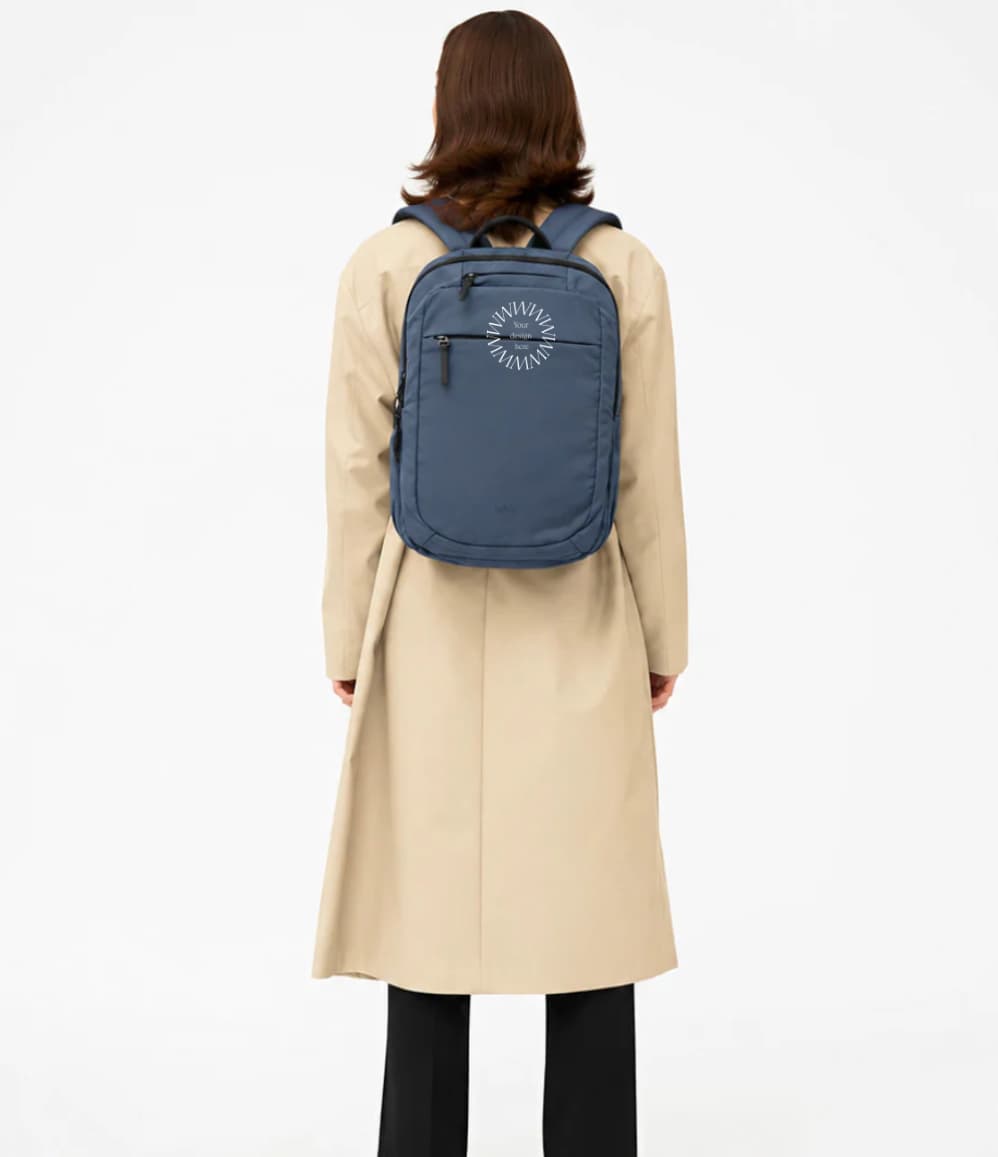 Lightweight Water Resistant Backpack 12L in blue, worn on the back
